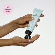 milk-shake-lifestyling-smoothing-cream-in-hand
